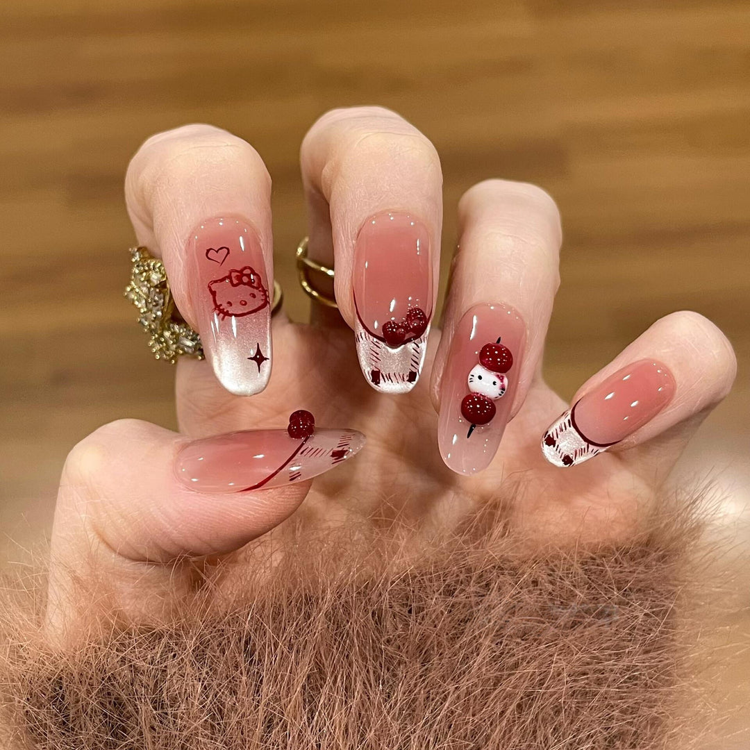 Artificial nails with playful Hello Kitty design Stornfield