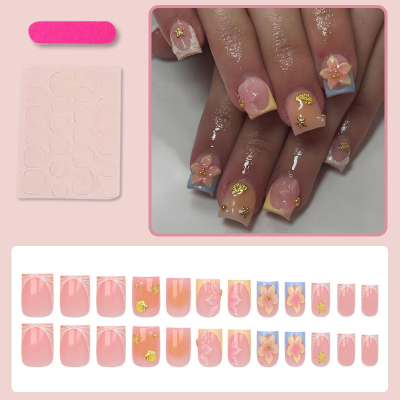 Nail art set with floral accents and elegant shine Stornfield