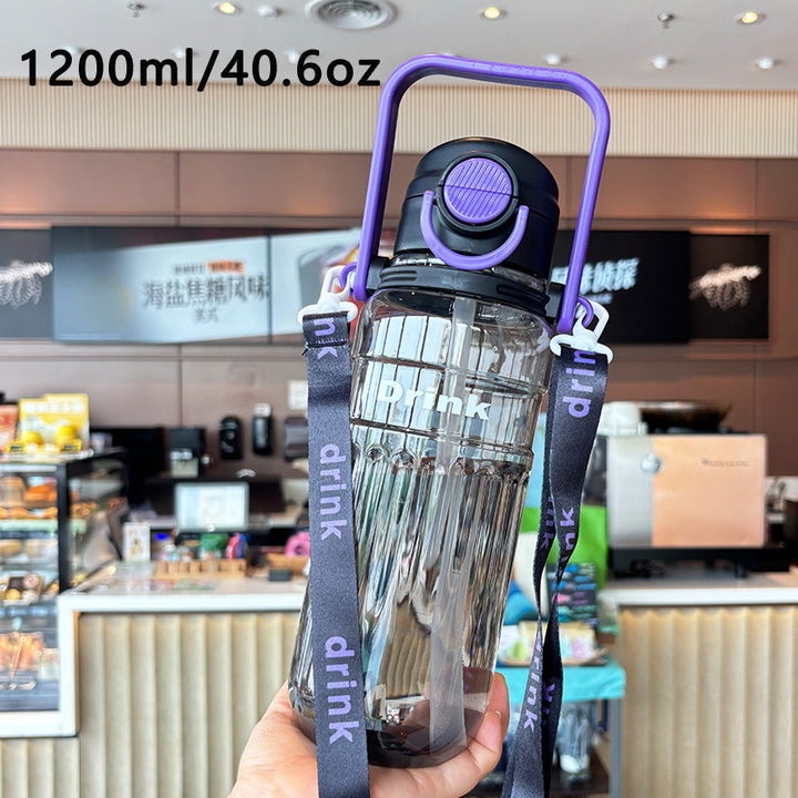 Women's large transparent drinking bottle with integrated carrying handle Stornfield