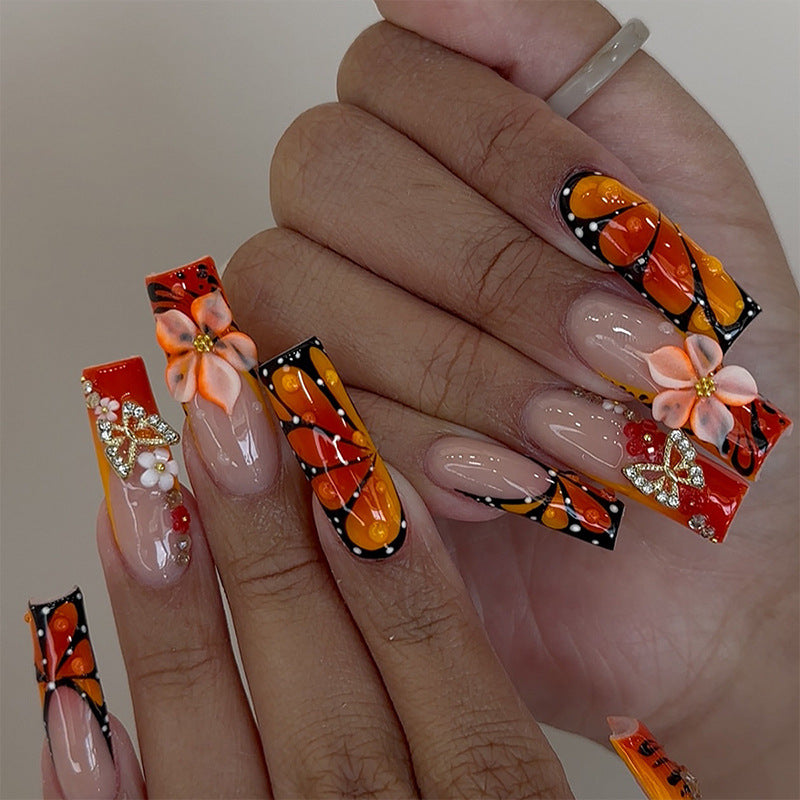 Artificial nail set with elegant floral and glamorous decorations Stornfield