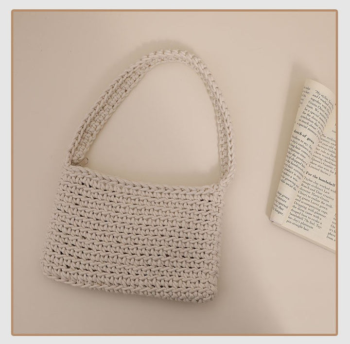 Handmade straw crossbody bag with structured design Stornfield