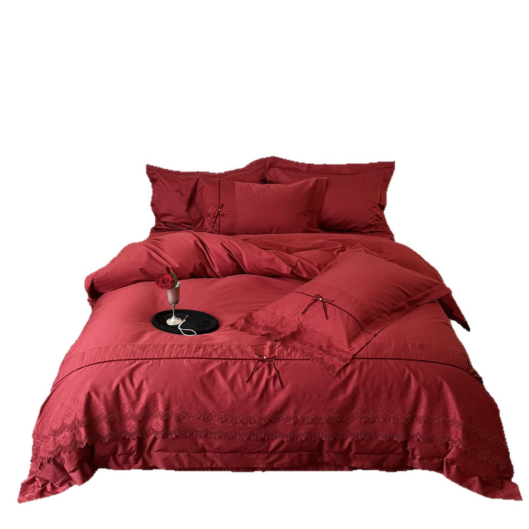 Romantic satin bedding set with lace trim, pleated detail and satin bows
