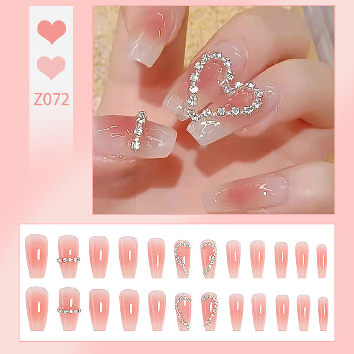 Artificial nails with romantic heart decorations Stornfield