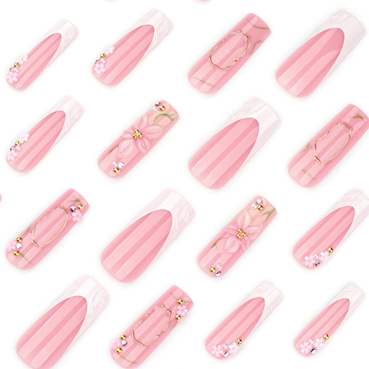 Artful nail extensions with floral embellishments Stornfield