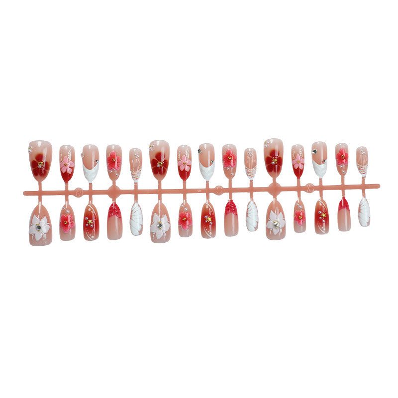 Artificial nail set with floral accents Stornfield