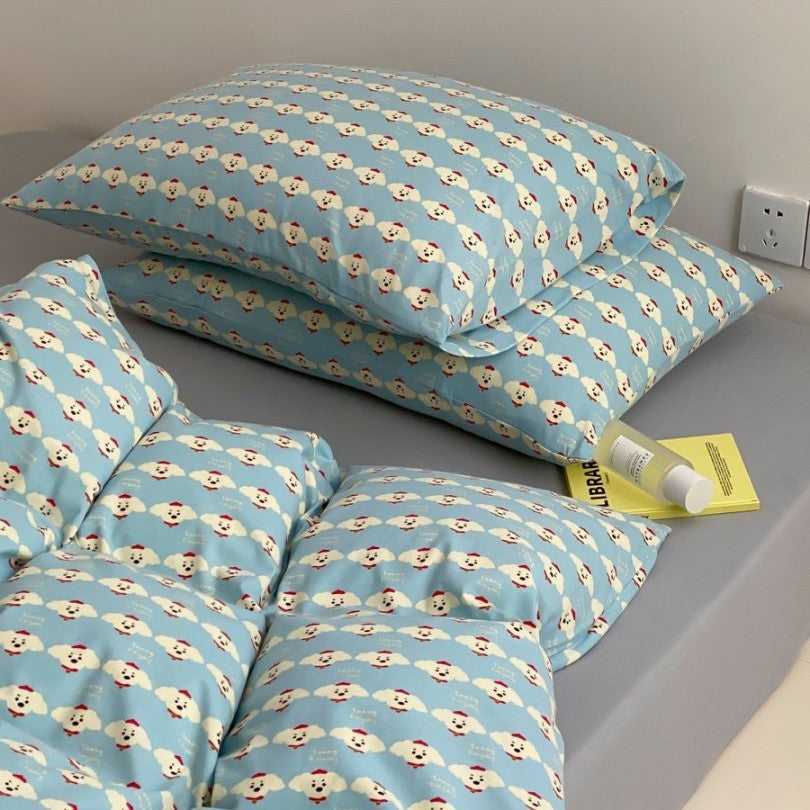 Light cotton bedding set with quilted topper and fine stripe pattern