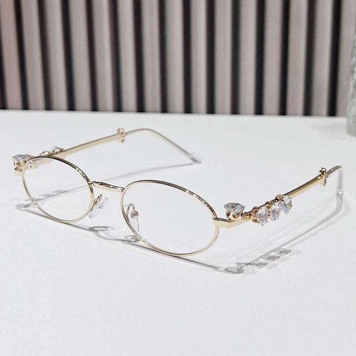 Fashion-Forward Oval Sunglasses with Crystal Accents Stornfield