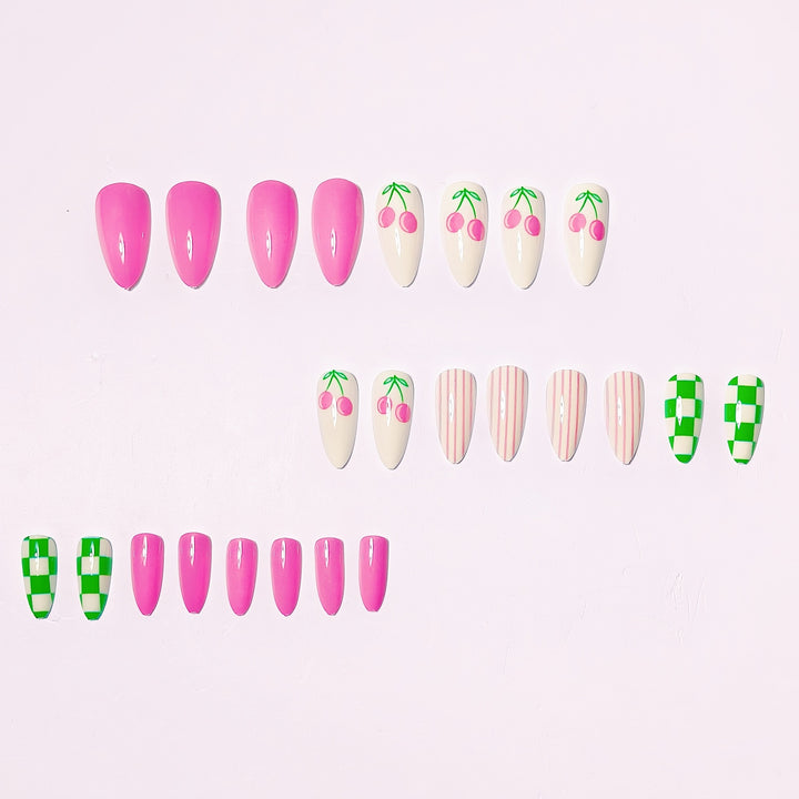 Artificial nails with fruity cherry design and striking colors Stornfield