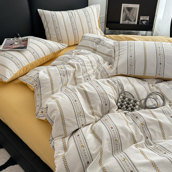 Striped cotton bedding set with washed finish, breathable percale & reversible function
