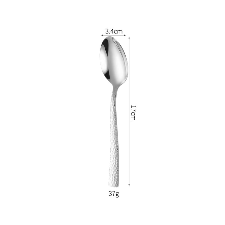 Elegant spoon with unique surface design Stornfield