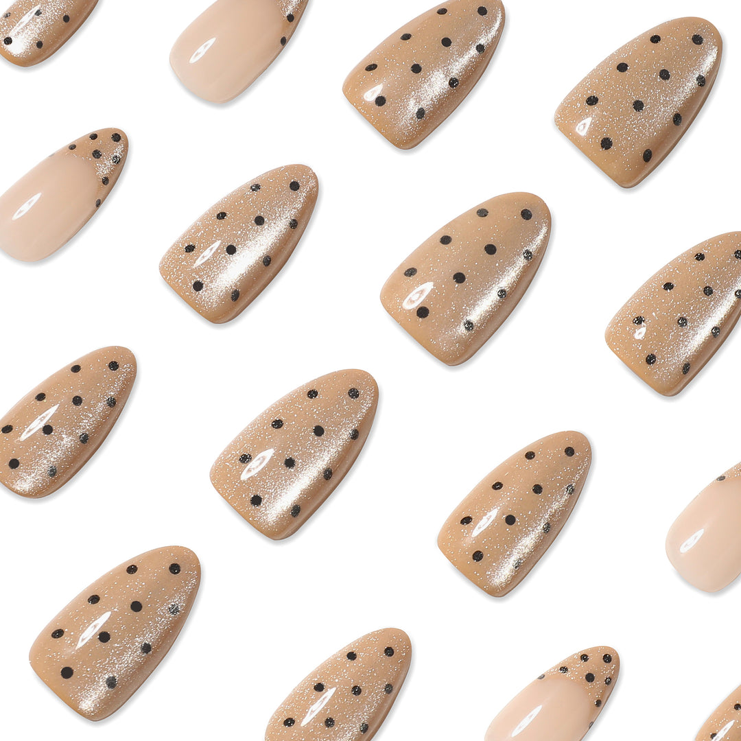 Elegant stiletto nails with glitter and dot design Stornfield