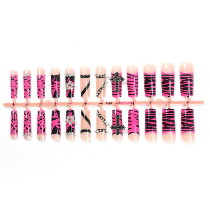 Artificial nail set with striking animal and glitter designs Stornfield