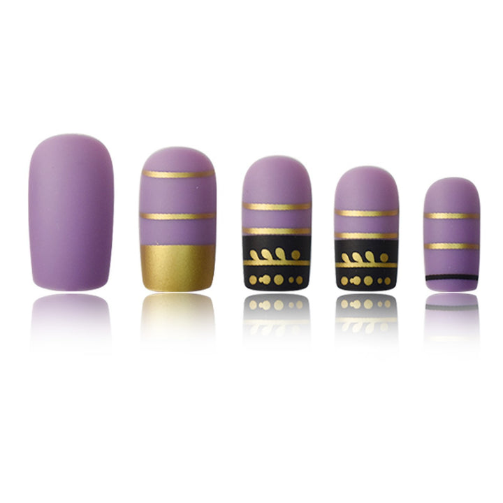 Trendy Press-On Nail Art with Decorative Gold Accents Stornfield