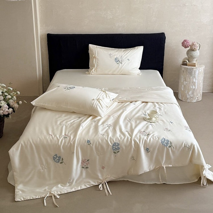 Embroidered satin bedspread set with ties and silky-glossy surface