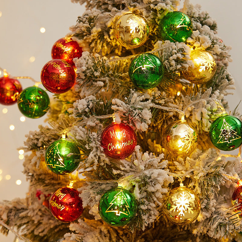 Festive string lights with Christmas ornaments Stornfield