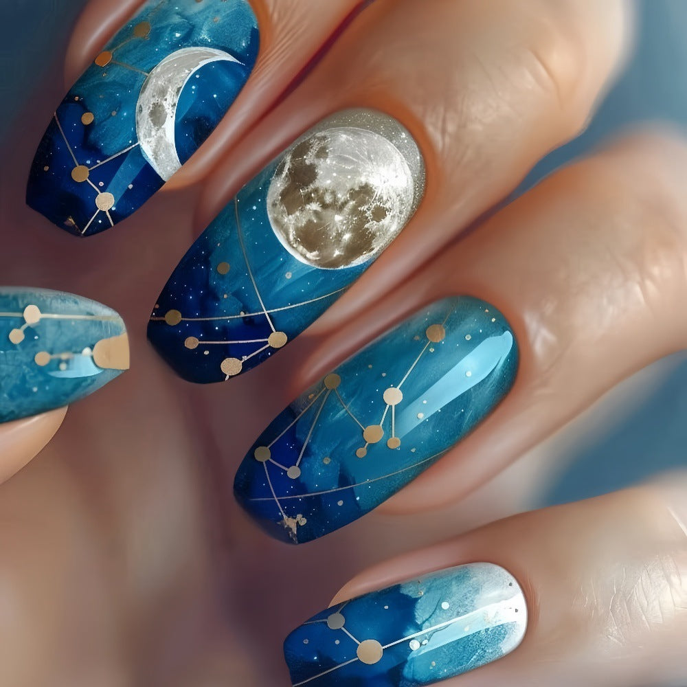 Dreamy artificial nails with moon and star design Stornfield