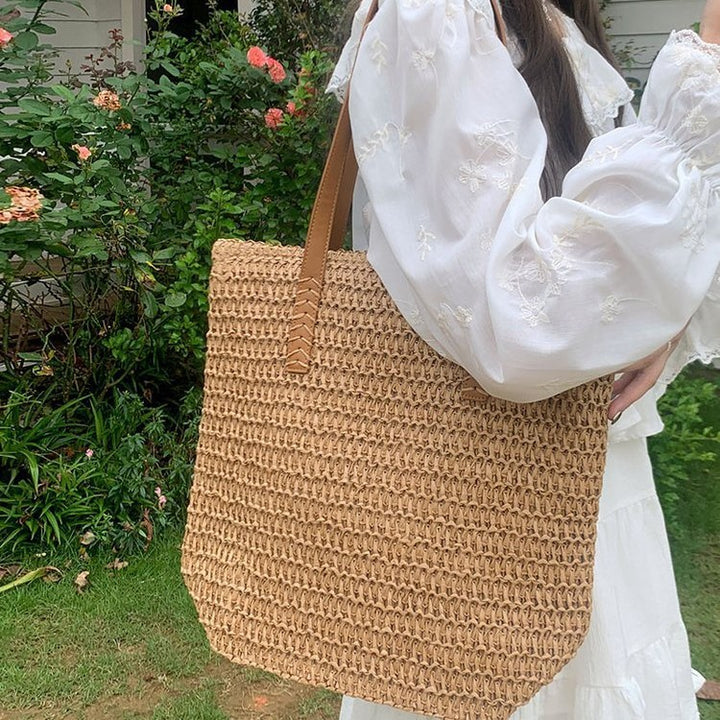 Handmade basket bag with elegant leather handle Stornfield