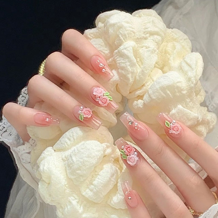 Glamorous artificial nails with moon and star motifs Stornfield