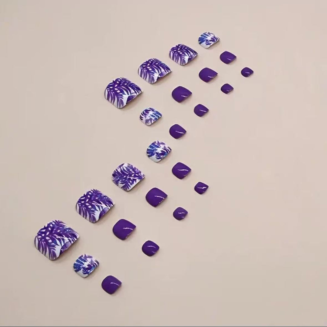 Nail art set with vibrant tropical motifs and glossy finish Stornfield