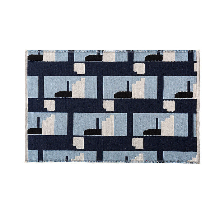 Modern geometric bathroom rug made of flat-woven cotton with non-slip backing Stornfield