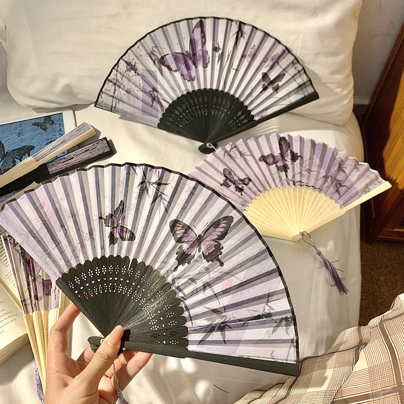 Elegant fan with elaborate butterfly motif Stornfield