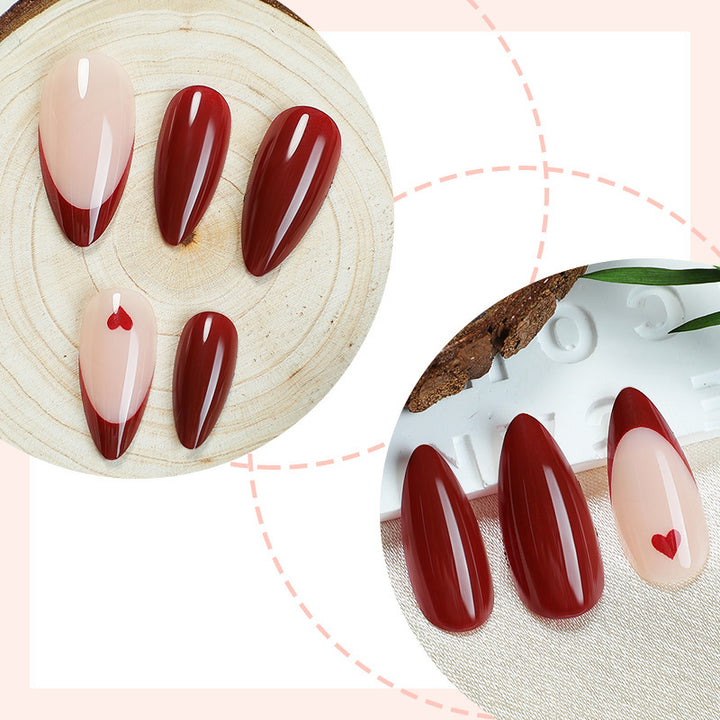 Acrylic nail set with elegant gradient and heart patterns Stornfield