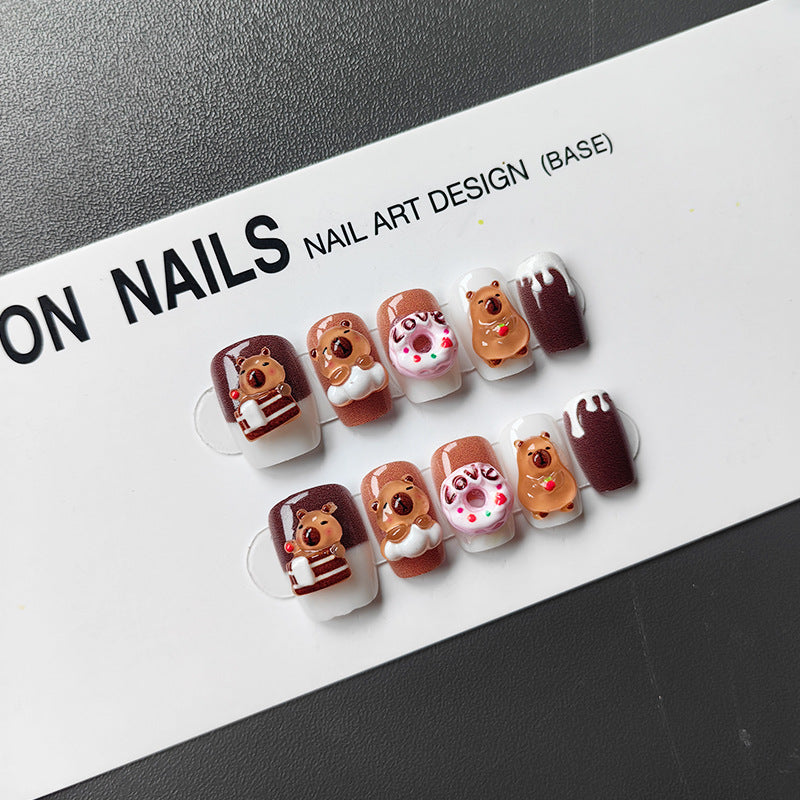 Playful art fake nails with animal motifs Stornfield