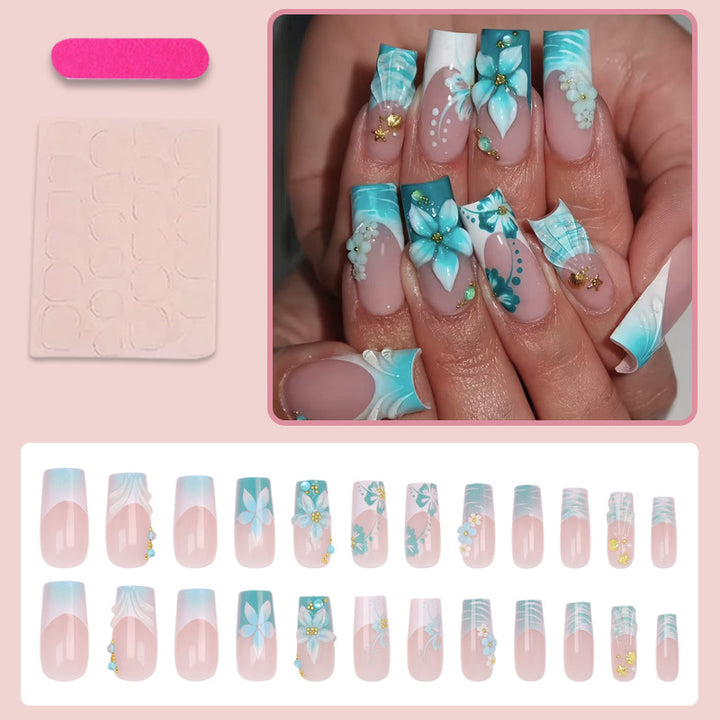 Acrylic nail set with elegant floral decorations and glitter accents Stornfield