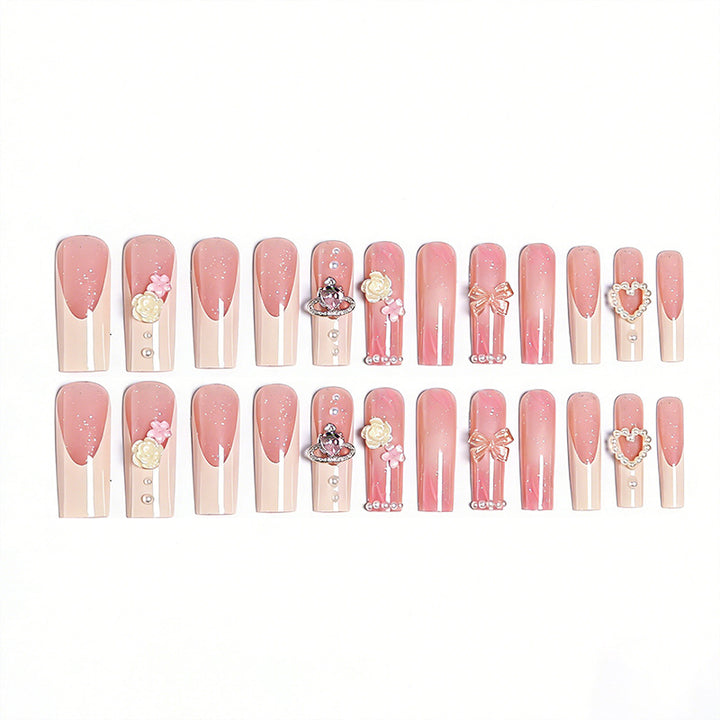 Artful nail tips with pearl and bow motifs Stornfield