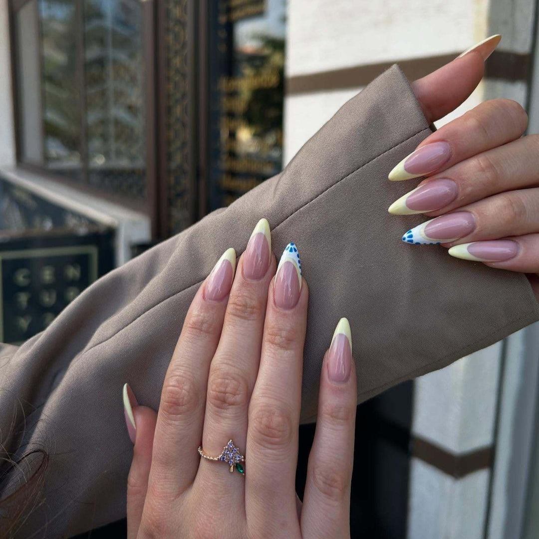 Artistic Stiletto Nail Design with Gradient Tips