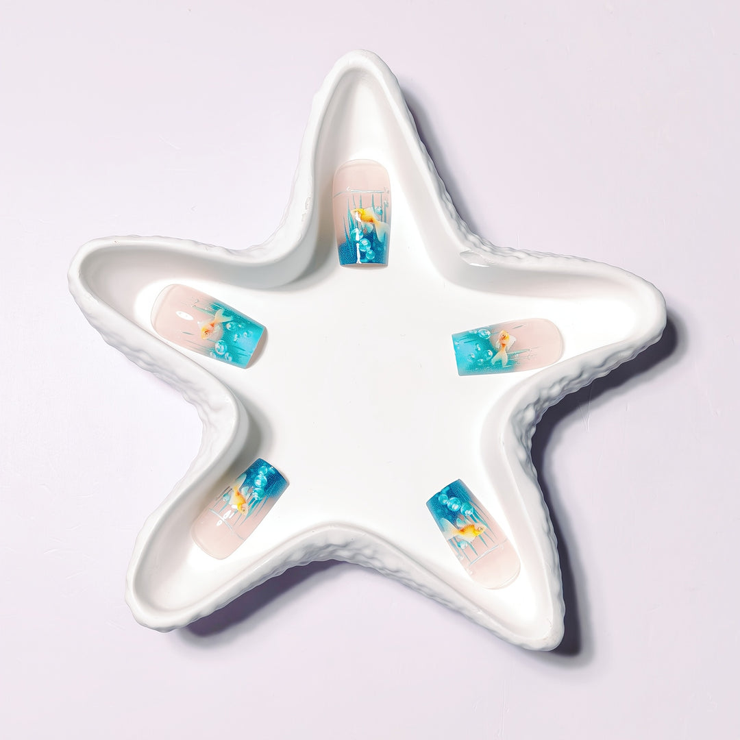 Creative art nails with maritime goldfish design Stornfield