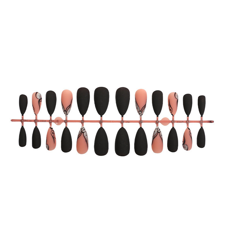 Creative nail art set with exquisite marbled designs and elegant accents Stornfield