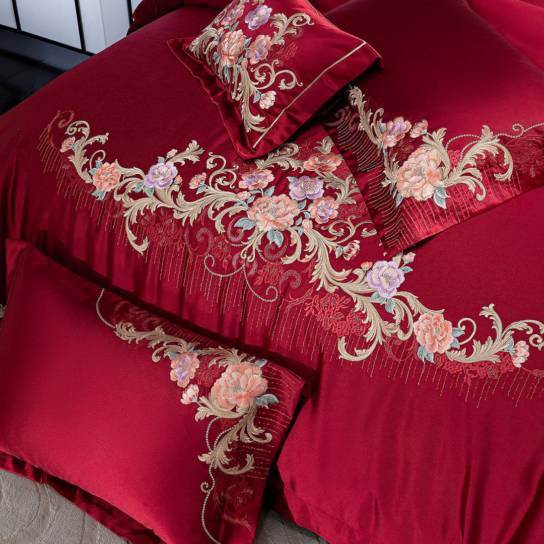 Embroidered satin bedding set with luxury appliqués