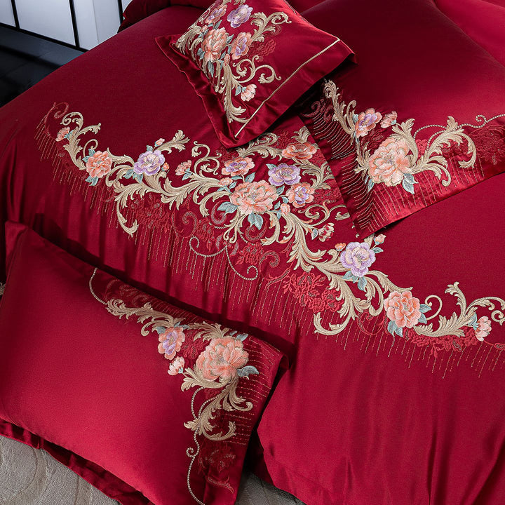 Embroidered satin bedding set with luxury appliqués