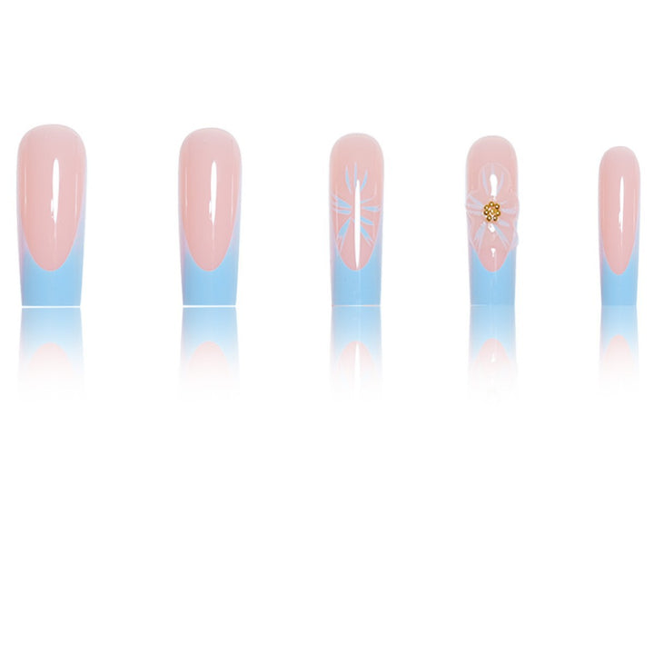 Artistic Long Press-On Nails with Floral Accents Stornfield