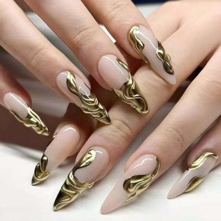 Artificial nails with golden, curved accents Stornfield