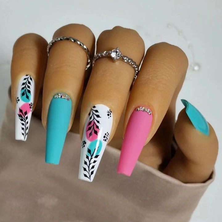 Artificial nails with floral design and creative accents Stornfield