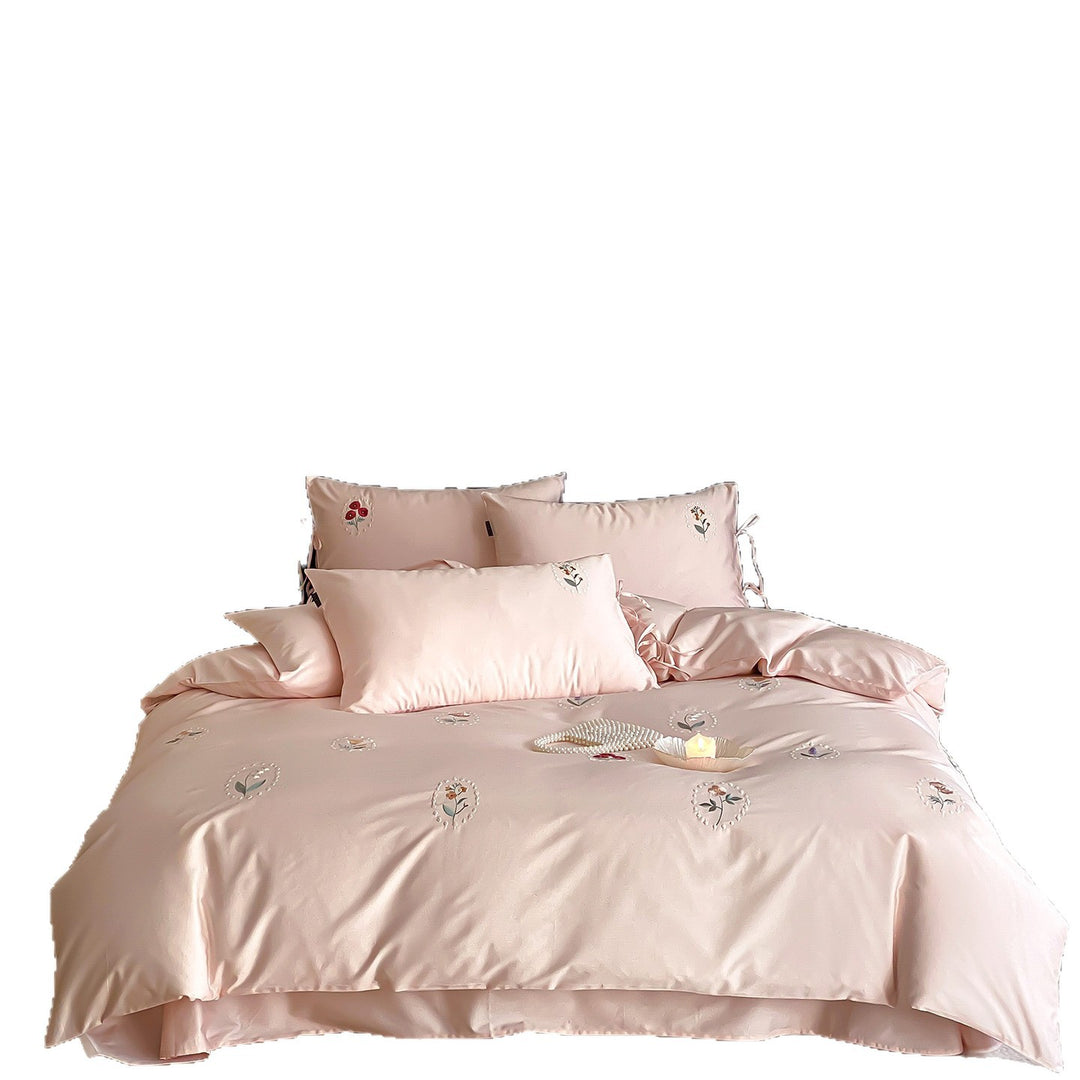 Luxurious cotton satin bedding set with delicate floral embroidery and ties
