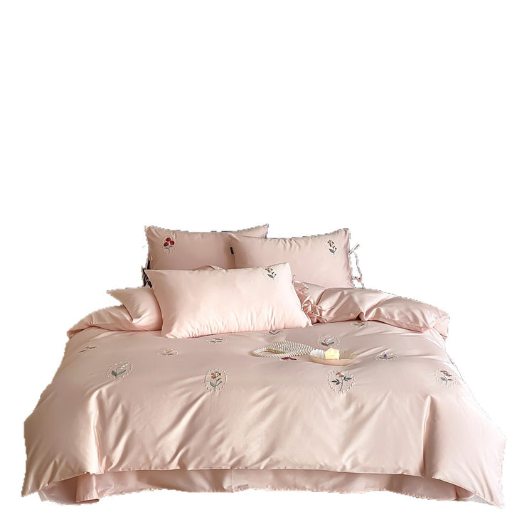 Luxurious cotton satin bedding set with delicate floral embroidery and ties