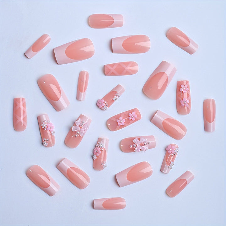Acrylic nail set with elegant 3D flowers and ribbon decorations Stornfield