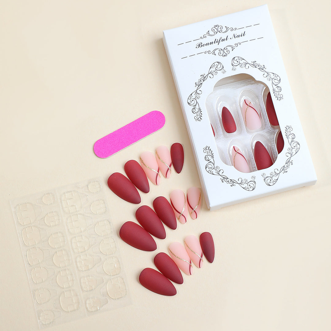 Elegant artificial nail set with matte finish and glamorous accents Stornfield