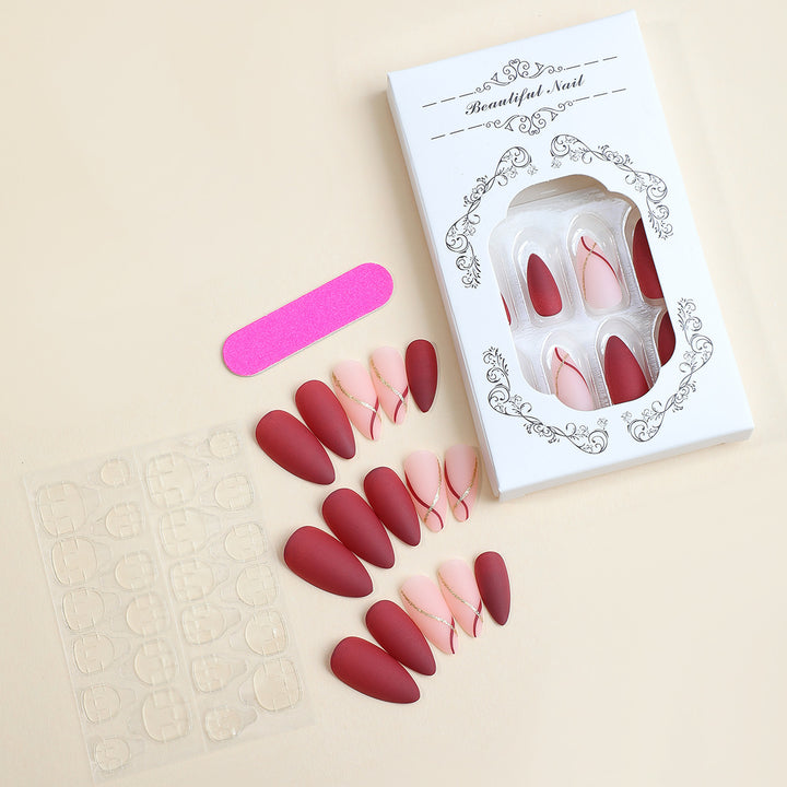 Elegant artificial nail set with matte finish and glamorous accents Stornfield