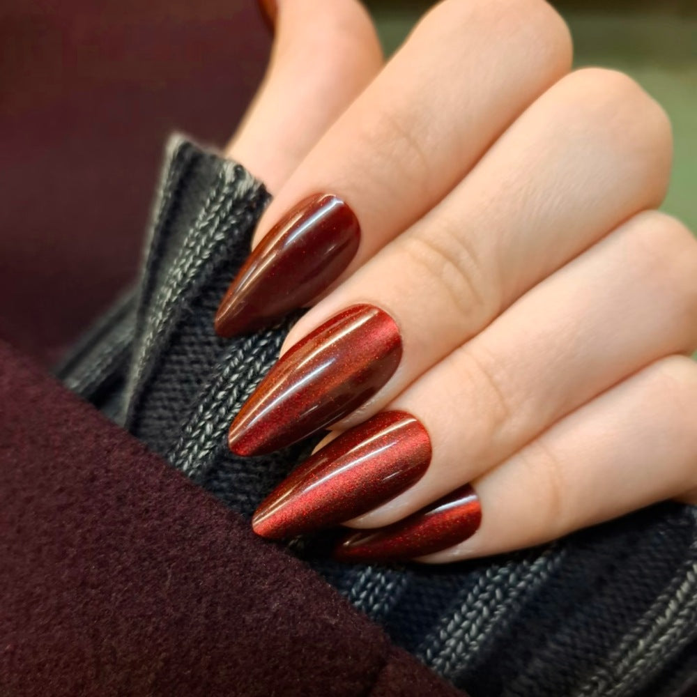 Artificial nails in modern glamour look Stornfield
