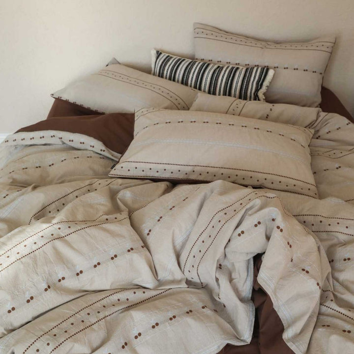 Reversible duvet cover set made of organic cotton in linen look with decorative eyelet embroidery