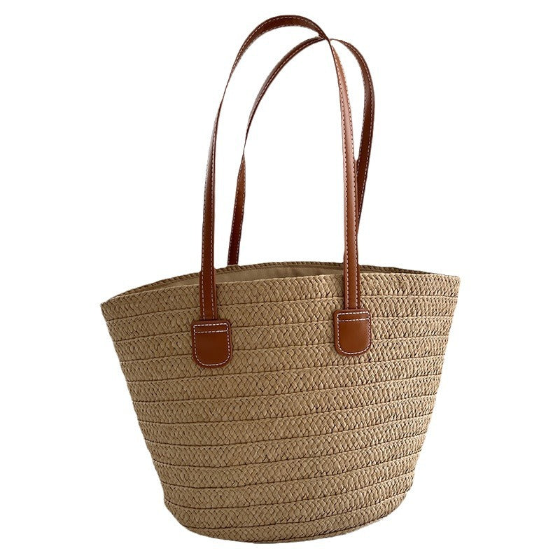 Handcrafted straw bag with elegant leather handles Stornfield