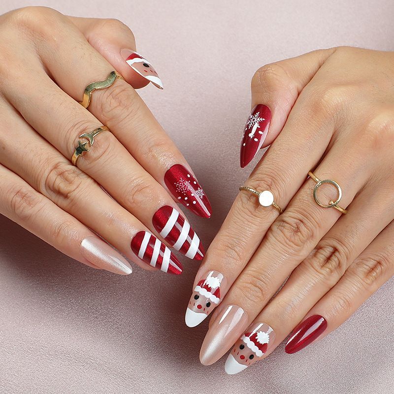 Acrylic nail set with glamorous golden accents Stornfield