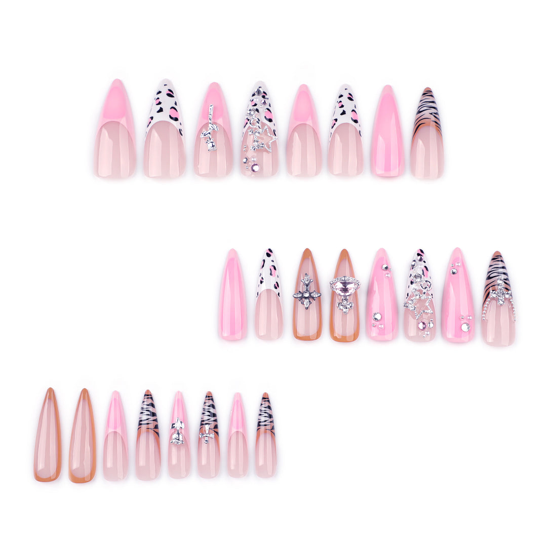 Artful stiletto nails with glitter and rhinestone embellishments Stornfield