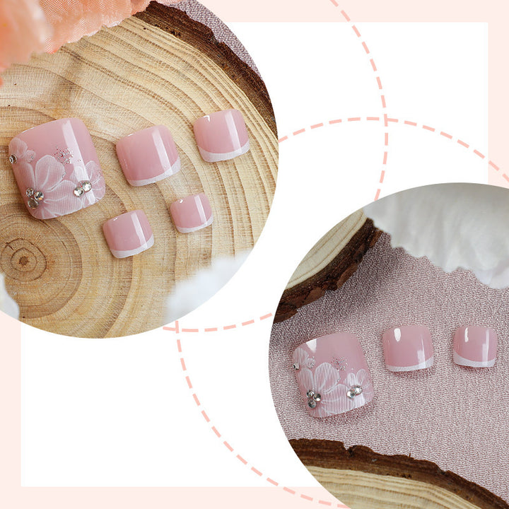 Nail art set with delicate floral design and glitter accents Stornfield