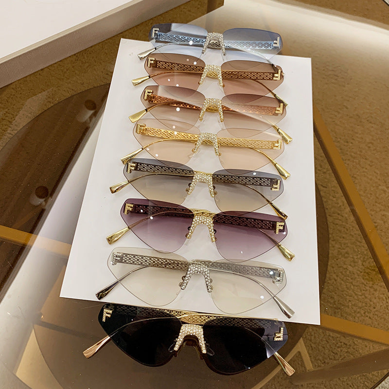 Women Designer Cat Eye Sunglasses with Sparkling Rhinestone Embellishment Stornfield