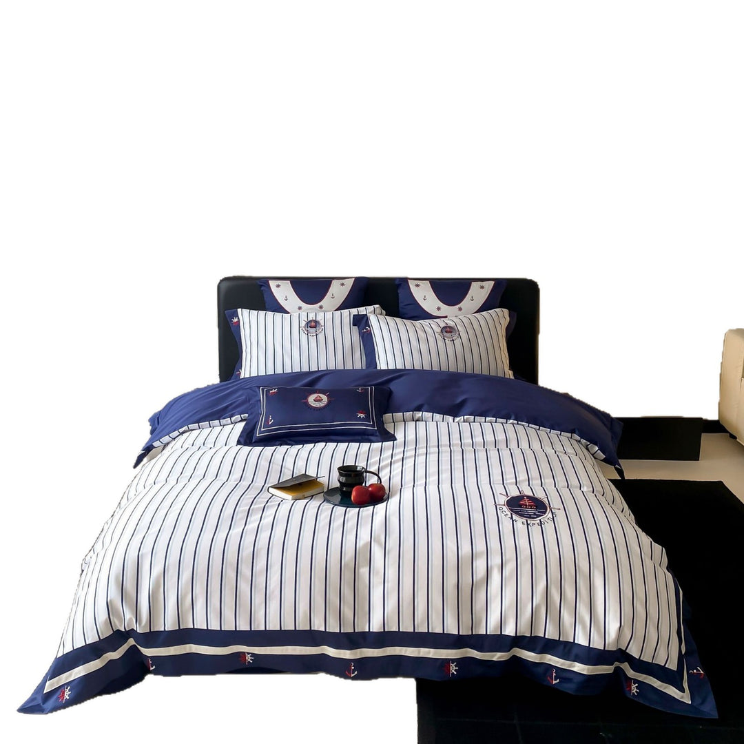 Maritime cotton satin bedding set with fine stripes, nautical embroidery, and reversible pillow